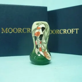 A Miniature Moorcroft Vase with Box and Sleeve.